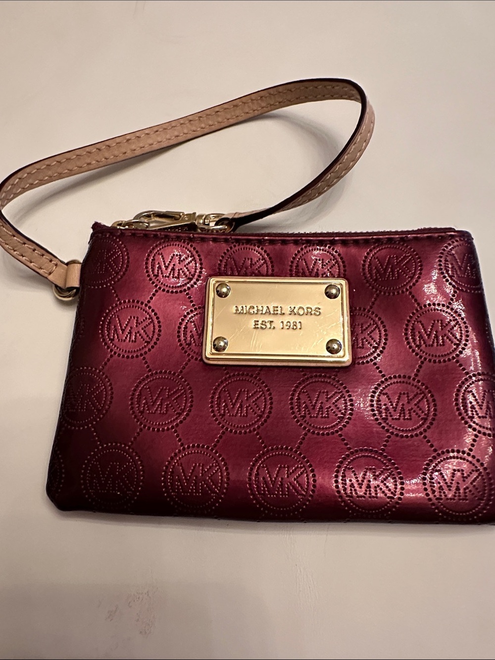 Michael Kors Burgundy Logo-Embossed Wristlet with Gold Plaque